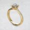 lab-created-round-cut-diamond-curly-prong-engagement-ring-sarlyn