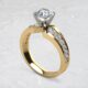 lab-created-round-cut-diamond-graduated-engagement-ring