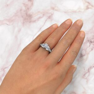 lab-created-round-cut-diamond-graduated-engagement-ring
