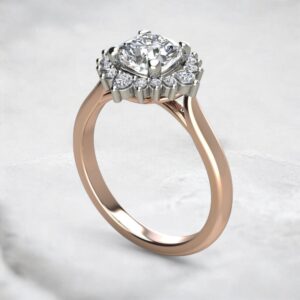 cathedral-halo-graduated-cushion-cut-moissanite-engagement-ring-rose-gold-sarlyn