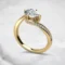 pear-cut-moissanite-diamond-wrapped-engagement-ring-yellow-gold-sarlyn