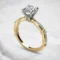 bamboo-oval-cut-moissanite-round-side-stone-engagement-ring-yellow-gold-sarlyn