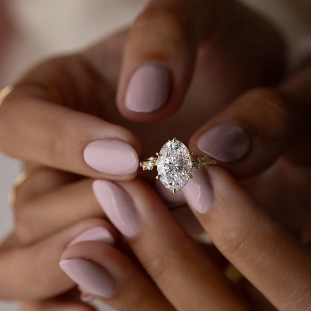 oval-cut-moissanite-solitaire-engagement-ring-yellow-gold-sarlyn