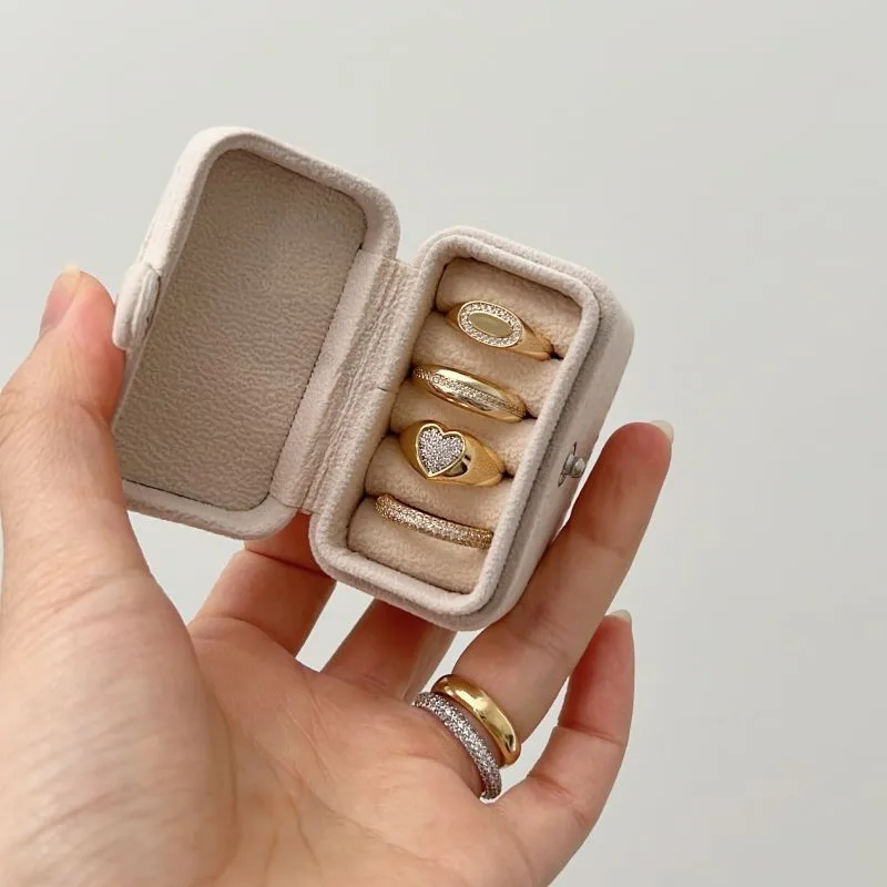 jewelry-for-every-occasion-rings-stored-in-soft-pouch-and-jewelry-box-sarlyn