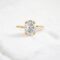 oval-cut-moissanite-solitaire-ring-with-double-button-prongs-sarlyn-1