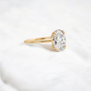 oval-cut-moissanite-solitaire-ring-with-double-button-prongs-sarlyn-2