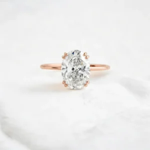 oval-cut-moissanite-solitaire-ring-with-double-button-prongs-sarlyn-3