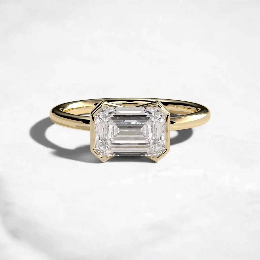 2ct-emerald-cut-diamond-half-bezel-engagement-ring-1