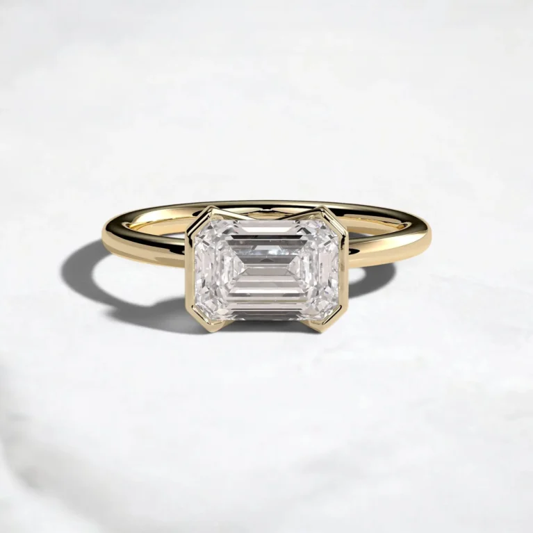 2ct-emerald-cut-diamond-half-bezel-engagement-ring-1
