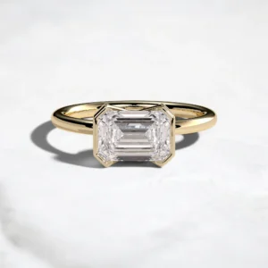 2ct-emerald-cut-diamond-half-bezel-engagement-ring-1