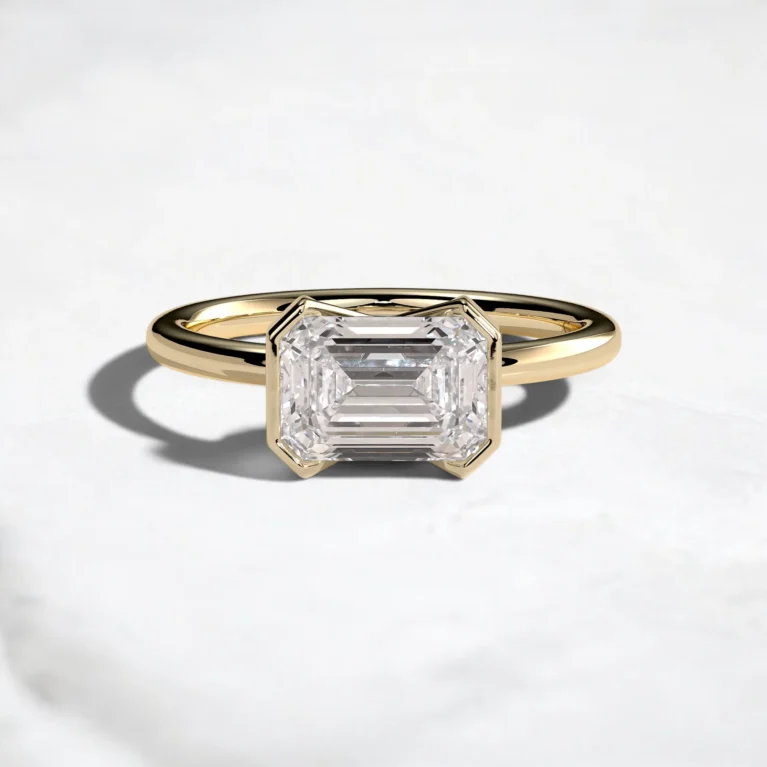 2ct-emerald-cut-diamond-half-bezel-engagement-ring-1