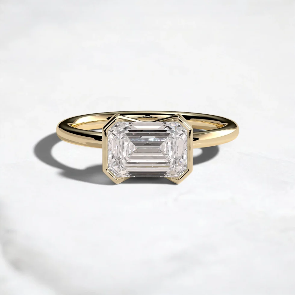 2ct-emerald-cut-diamond-half-bezel-engagement-ring-1