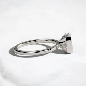 2ct-emerald-cut-diamond-half-bezel-engagement-ring-11