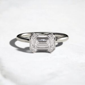 2ct-emerald-cut-diamond-half-bezel-engagement-ring-9