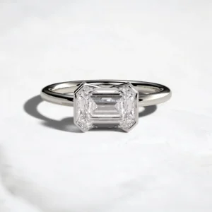 2ct-emerald-cut-diamond-half-bezel-engagement-ring-9