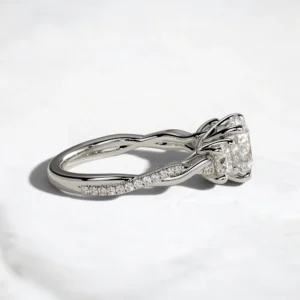 three-stone-round-cut-diamond-twisted-pave-band-engagement-ring-11